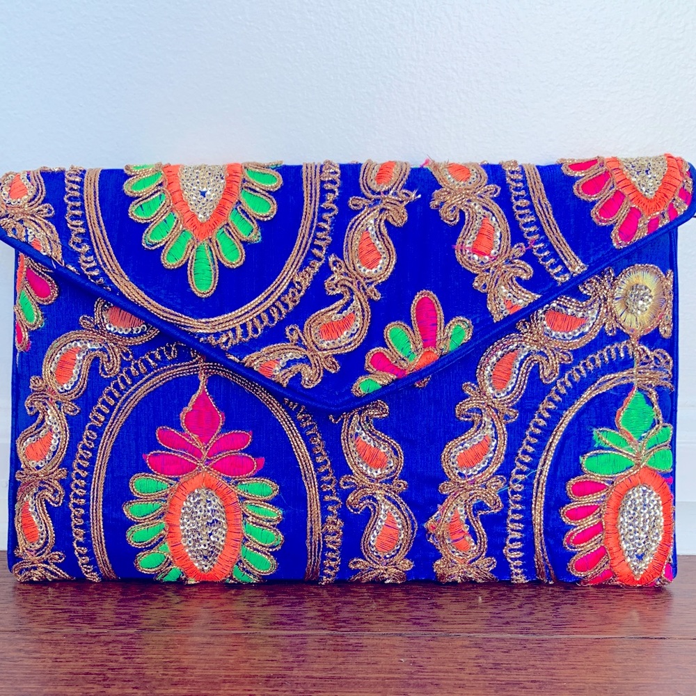 Women’s embroidered fold over clutch hand bag
